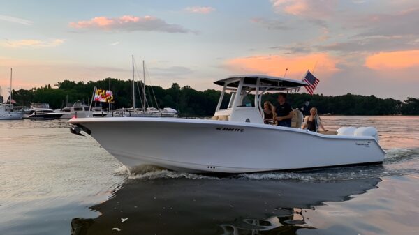 A boat with people on it in the water.